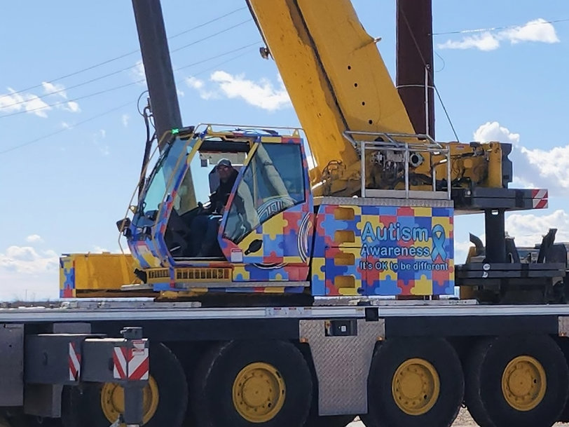Manitowoc: Nimble Crane to shine light on Autism Awareness Month with vibrant crane wrap